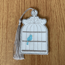 1279. Bird in cage bookmark.