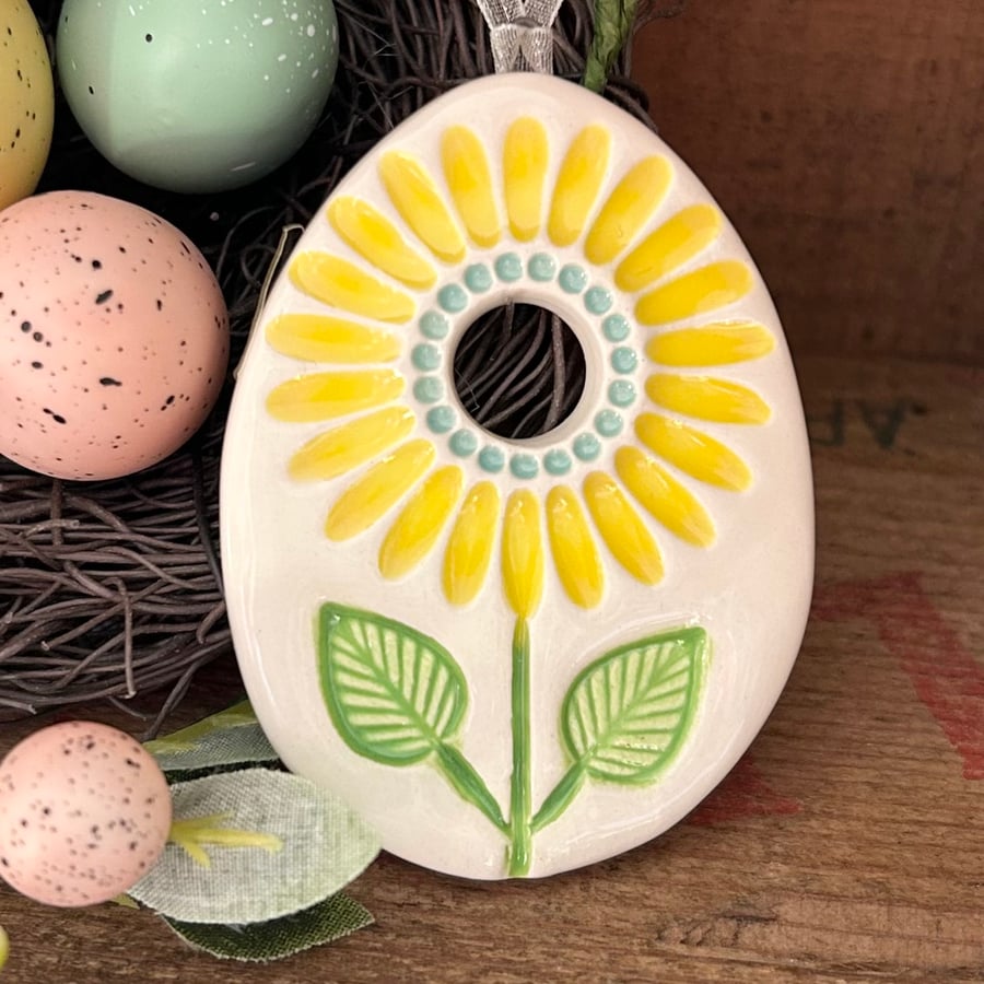 Pottery Easter Egg decoration with sunflower