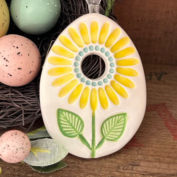 Pottery Easter Egg decoration with sunflower