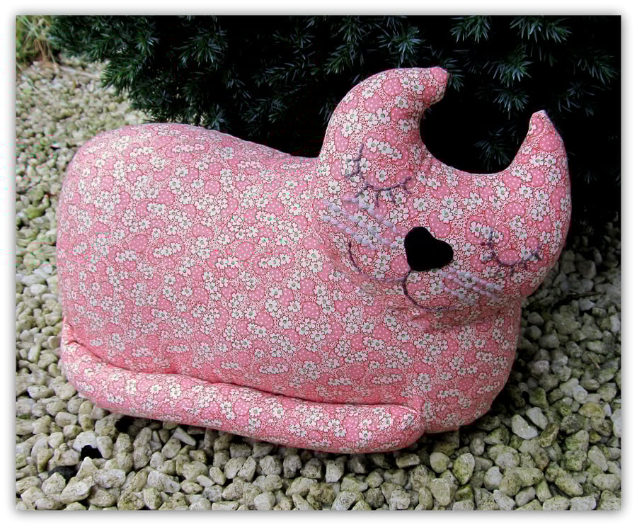 Snoozy cat cushion, Myrtle.