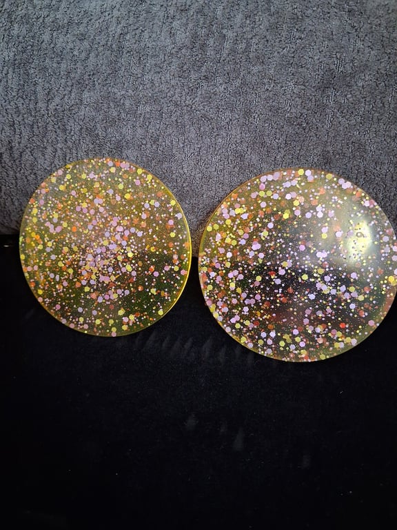 Set of two handmade epoxy resin coasters. Yellow with glitter mix 
