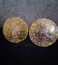 Set of two handmade epoxy resin coasters. Yellow with glitter mix 