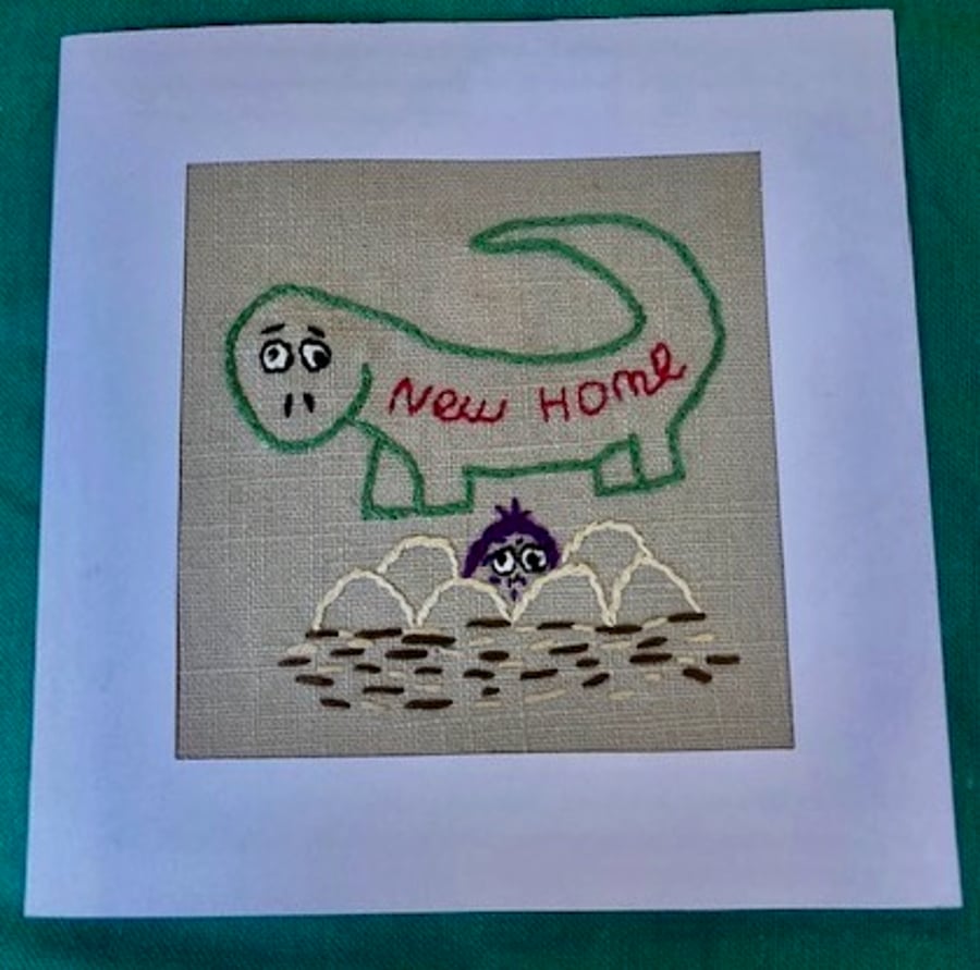 New home embroidered character card.