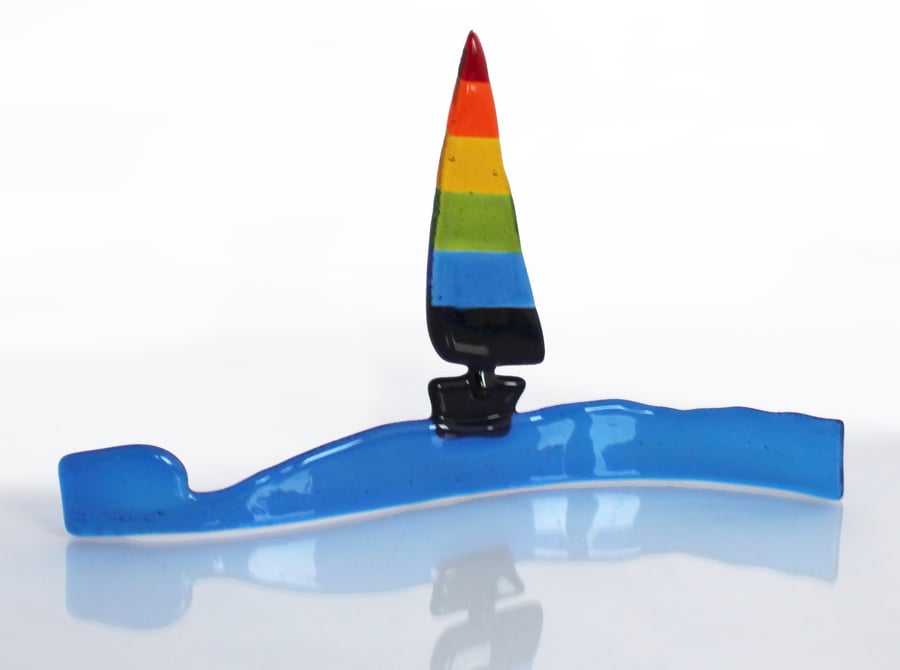 Rainbow glass sailing boat sculpture