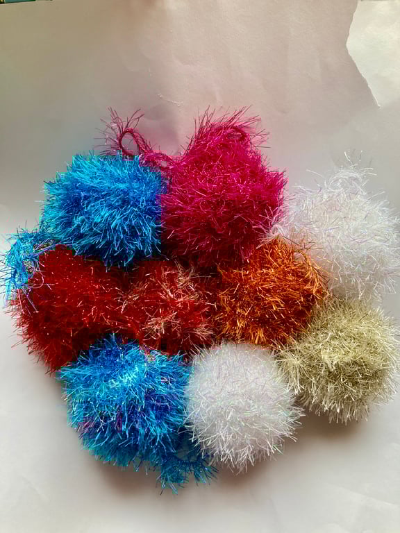 9 sparkly hand knitted baubles 