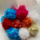 9 sparkly hand knitted baubles 