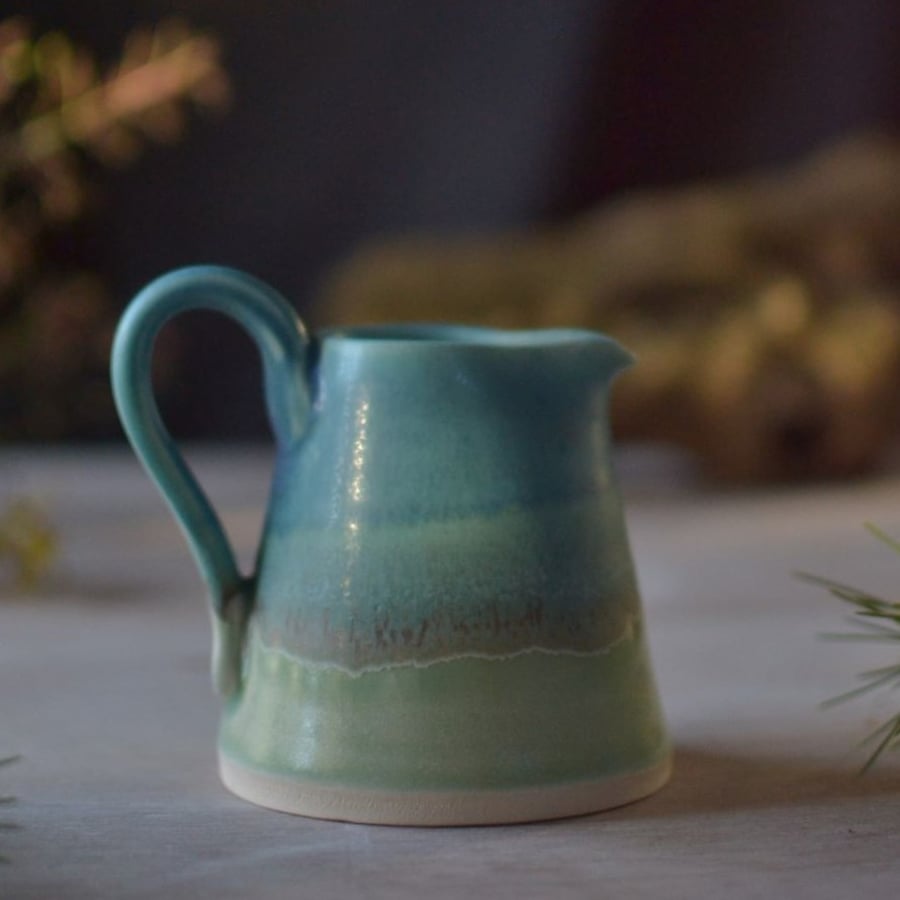 Handmade ceramic medium jug -  Decorated in blues and turquoise glazes