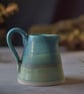 Handmade ceramic medium jug -  Decorated in blues and turquoise glazes