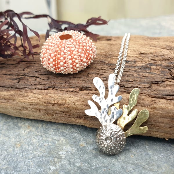 Silver sea urchin and seaweed pendant