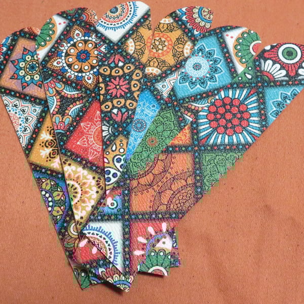 Fancy bookmarks made from faux Leather (plastic) vegan friendly.