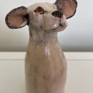 Handmade ceramic black and white dog 