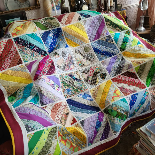 Handmade patchwork quilts on Folksy