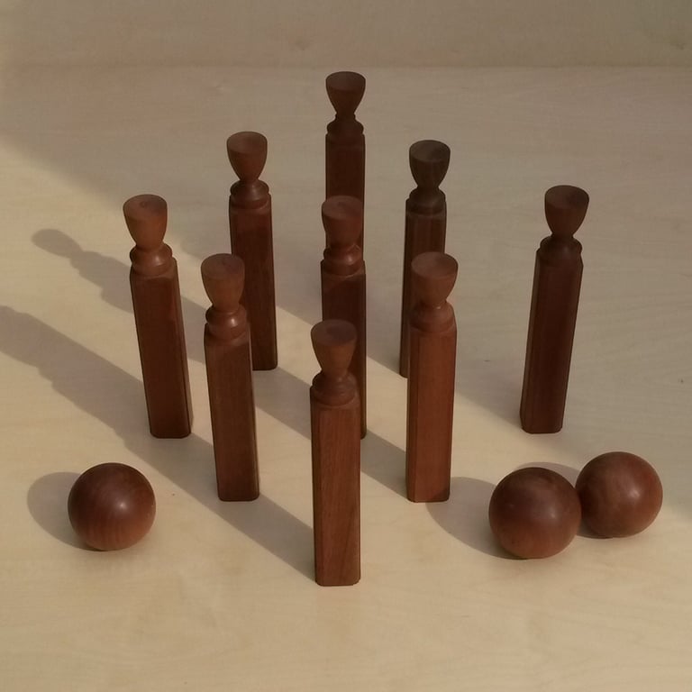 "Camden Quilles" : Skittles with three bowls, sapele wood