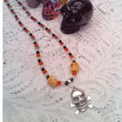 Skull & Crossbones Pendant on a Red Black and White Necklace, Halloween