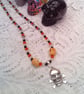 Skull & Crossbones Pendant on a Red Black and White Necklace, Halloween