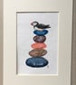 Pebble pile with puffin painting  - Image 1