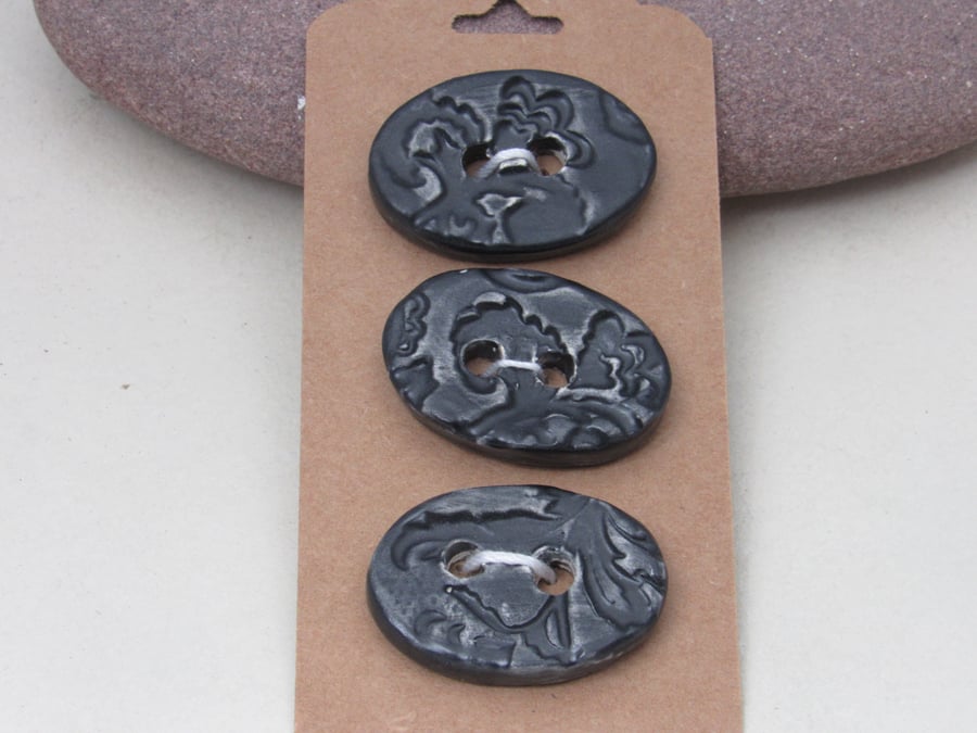 3 Medium Oval Coal Black Brocade Pattern Ceramic Buttons
