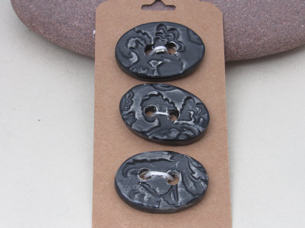 3 Medium Oval Coal Black Brocade Pattern Ceramic Buttons