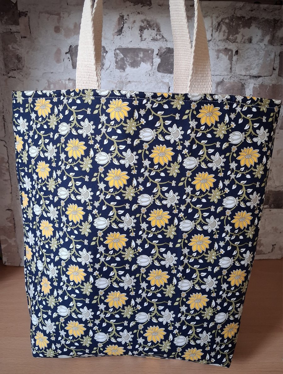 COLOURFUL FLOWERED TOTE ON NAVY BACKGROUND