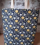 COLOURFUL FLOWERED TOTE ON NAVY BACKGROUND