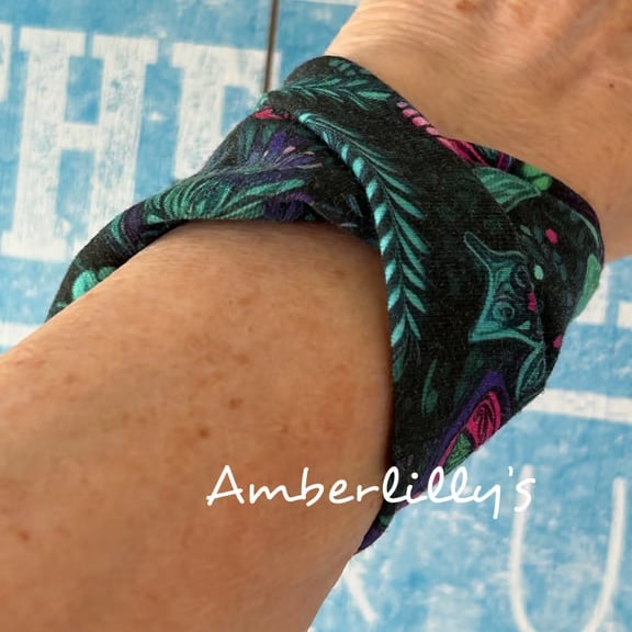 Flat twist wrist band bracelet