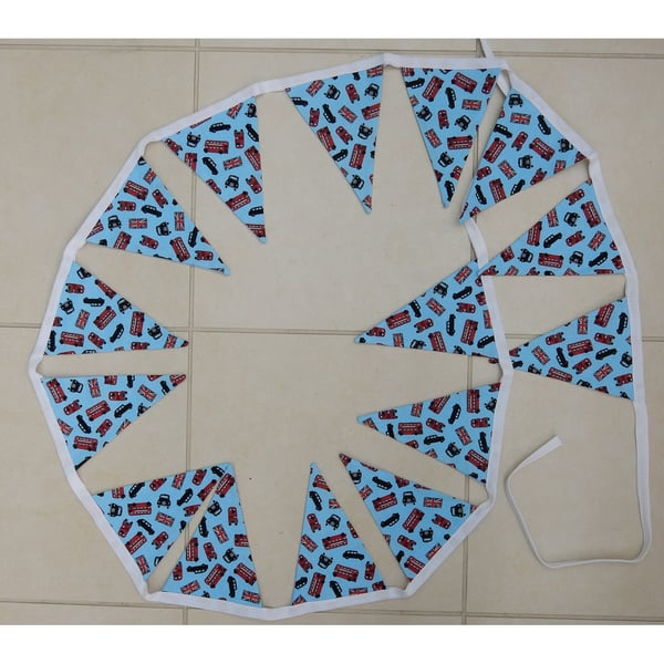 Bunting blue with taxis and red busses