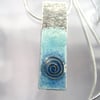 Enamelled sterling silver necklace with sea swirl.