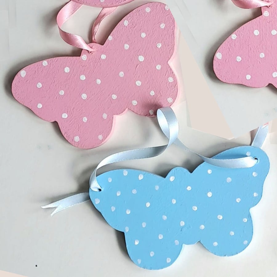 Two butterfly door and cot hangers