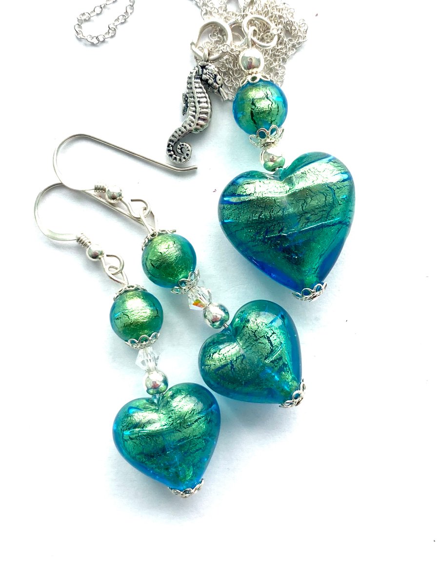 Murano glass green jewellery set with sterling silver charm and chain.