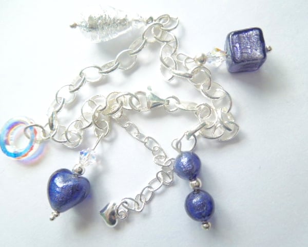 Murano glass sterling silver and purple handmade charm bracelet.