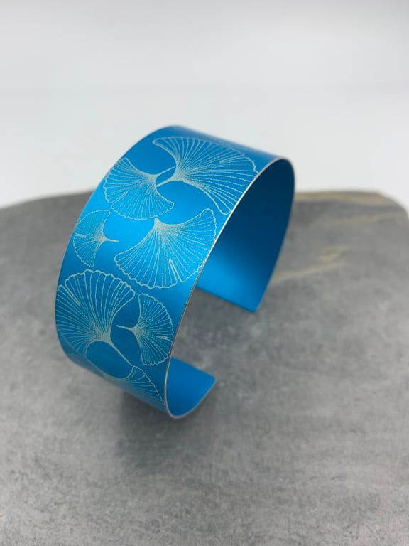Turquoise ginkgo aluminium cuff.