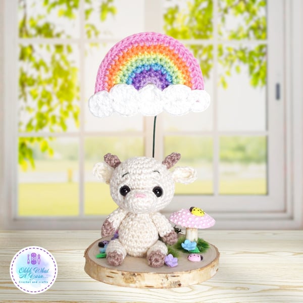 Crochet goat and rainbow sculpture. Goat ornament. Goat gift. Goat decoration.