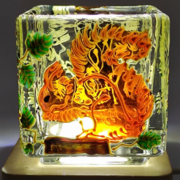 Hand painted glass candle holder, squirrel foraging in pine tree woods