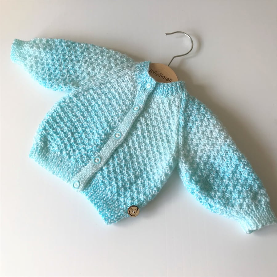 Newborn hand knitted baby cardigan