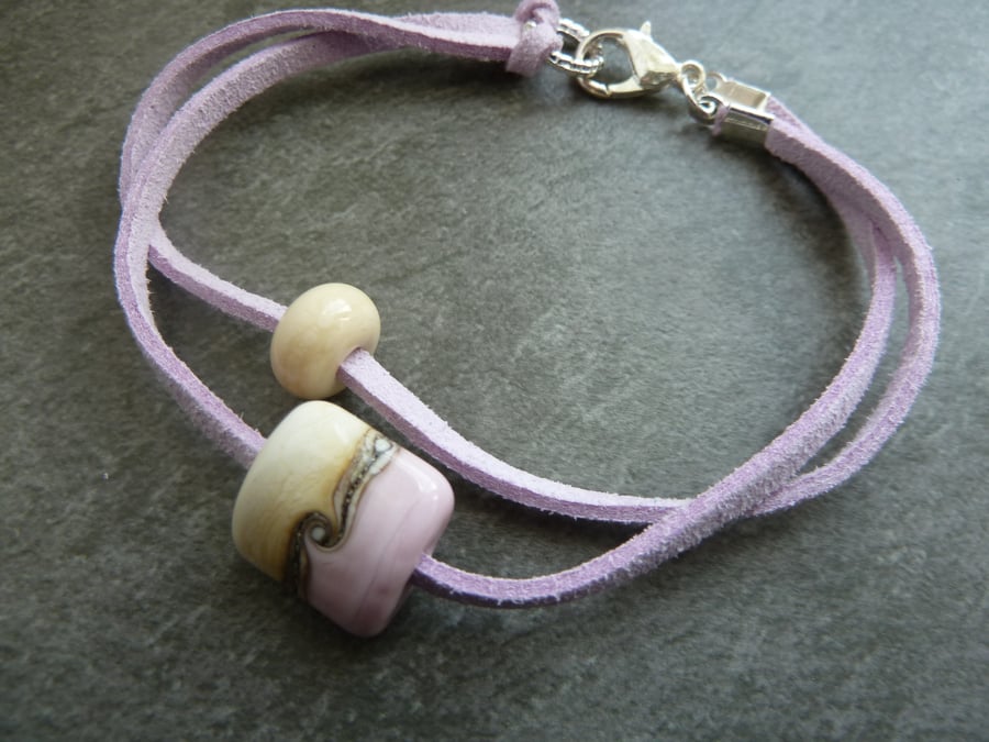 pink lampwork glass, faux suede bracelet
