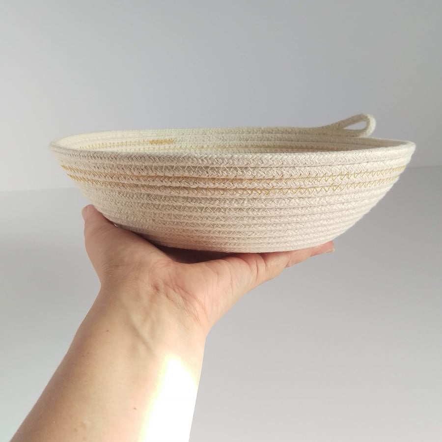 Freshwater Bay Bowl, a coiled rope bowl with ochre stitched detail