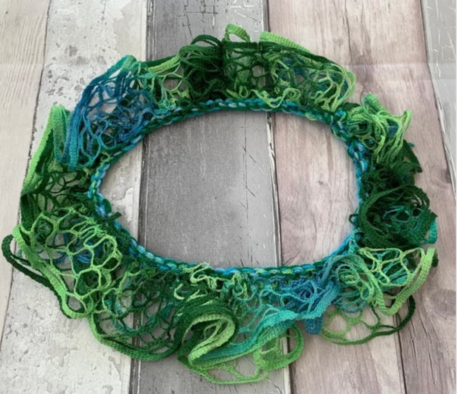 Green knitted necklace scarf , infinity scarf, scarf in a bag 