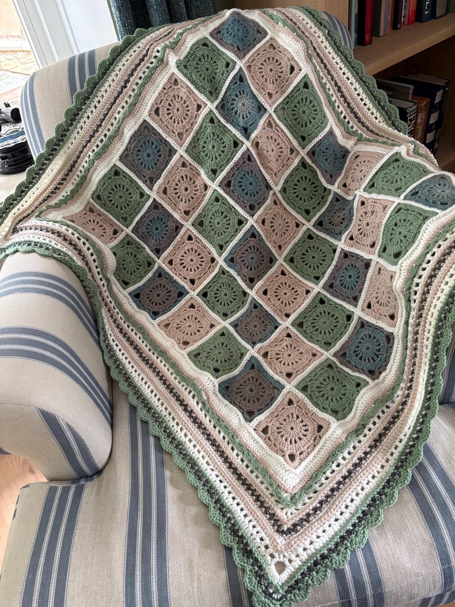 Crocheted lap blanket in autumn colours