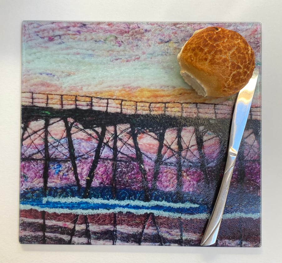 Glass chopping board, bread board or worktop saver.