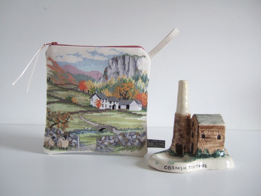Make up bag or pouch, in vintage cross stitch with a countryside illustration.