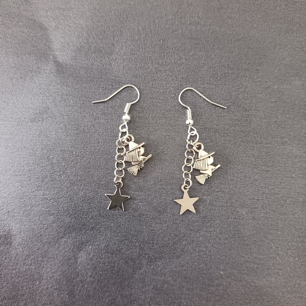 Silver witch and star charm dangle earrings 