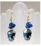 Sugar Skull Earrings with Blue Metal Roses  - Image 1