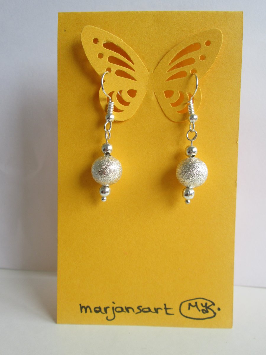 Silver plate beads dangle earrings