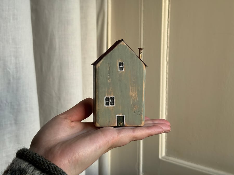 Little Wooden House with a Tin Roof