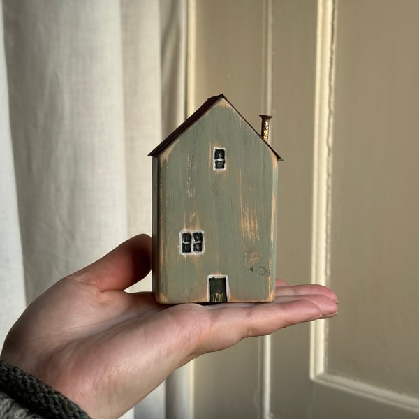 Little Wooden House with a Tin Roof