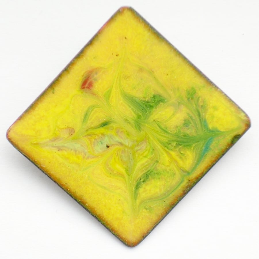 enamel brooch - square, scrolled green and red on yellow