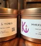 Myrrh & Tonka scented soy candle in a rose gold tin 