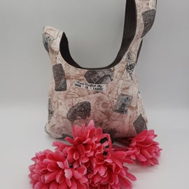  Knot bag,  small, reversible in grey denim and madam print fabric 