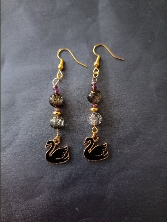 Beaded black swan dangle earrings
