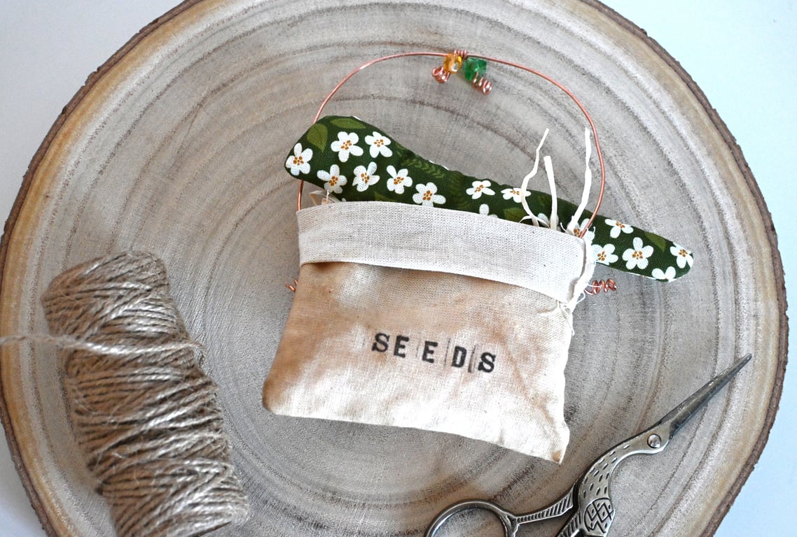 Primitive green bird seed bag 